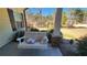 Cozy front porch with a charming swing, perfect for relaxing and enjoying the outdoors at 275 Bridgemill Dr, Douglasville, GA 30134