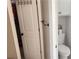 Half bathroom features shiplap walls, neutral paint, and a toilet at 275 Bridgemill Dr, Douglasville, GA 30134