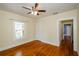 Bedroom with hardwood floors, neutral walls, and ample natural light at 17 Peachtree Ne Ave, Atlanta, GA 30305