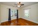 Bright bedroom with hardwood floors, large windows, and neutral color palette at 17 Peachtree Ne Ave, Atlanta, GA 30305
