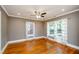 Cozy bedroom with hardwood floors, ceiling fan and natural light at 17 Peachtree Ne Ave, Atlanta, GA 30305