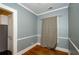 Cozy dining room featuring blue walls and wood flooring at 17 Peachtree Ne Ave, Atlanta, GA 30305