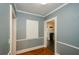 Hallway area with neutral wall color and view of the kitchen at 17 Peachtree Ne Ave, Atlanta, GA 30305