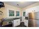 Bright kitchen area featuring stainless steel appliances, a double sink and natural light at 17 Peachtree Ne Ave, Atlanta, GA 30305