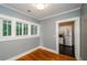 Cozy living room with hardwood floors and access to a modern kitchen at 17 Peachtree Ne Ave, Atlanta, GA 30305