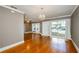 Open living room with hardwood floors, chandelier, ceiling fan and lots of light at 17 Peachtree Ne Ave, Atlanta, GA 30305