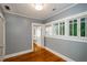 Bright living room featuring hardwood floors, natural light, and neutral paint at 17 Peachtree Ne Ave, Atlanta, GA 30305