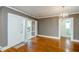 Inviting living room featuring hardwood floors and a stylish light fixture at 17 Peachtree Ne Ave, Atlanta, GA 30305