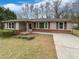 Inviting home with a cozy front porch and neatly landscaped yard at 1793 Witt Cir, Austell, GA 30168