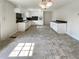 Bright kitchen featuring white cabinets, laminate countertops, and neutral colored tile flooring at 1793 Witt Cir, Austell, GA 30168