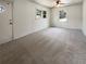Living room featuring neutral colored walls, carpeted floors, and natural lighting at 1793 Witt Cir, Austell, GA 30168