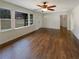 Open living room featuring hardwood floors, a ceiling fan, and lots of natural light at 1793 Witt Cir, Austell, GA 30168