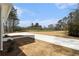 Large backyard featuring a well-manicured lawn and an expansive driveway at 529 Claude Scott Rd, Canton, GA 30115