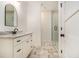 Modern bathroom features a granite countertop vanity and a glass-enclosed shower at 529 Claude Scott Rd, Canton, GA 30115