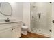 Bathroom featuring a white vanity, and glass enclosed shower at 529 Claude Scott Rd, Canton, GA 30115
