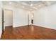 Large bedroom with custom ceiling, hardwood floors, and ensuite bathroom at 529 Claude Scott Rd, Canton, GA 30115