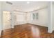 Bedroom features built-in shelving and drawers with hardwood floors at 529 Claude Scott Rd, Canton, GA 30115