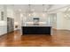 Modern kitchen featuring a large island with dark cabinetry, stainless steel appliances, and ample counter space at 529 Claude Scott Rd, Canton, GA 30115