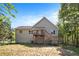 Backyard view of home featuring a deck and stairs leading to the yard at 221 Makayla Way, Temple, GA 30179