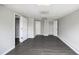 Spacious finished basement featuring wood flooring and neutral paint, perfect for entertaining at 221 Makayla Way, Temple, GA 30179