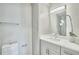 Updated bathroom features bright lighting, a modern vanity, marble countertops, and a shower at 2657 Lenox Ne Rd # 29-1, Atlanta, GA 30324