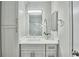 Stylish bathroom with white vanity, granite countertop, shower, and storage at 2657 Lenox Ne Rd # 29-1, Atlanta, GA 30324