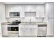 Updated kitchen featuring stainless steel appliances, granite countertops, and lots of storage at 2657 Lenox Ne Rd # 29-1, Atlanta, GA 30324
