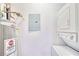 Laundry room includes a stacked washer and dryer and a water heater at 2657 Lenox Ne Rd # 29-1, Atlanta, GA 30324