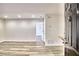 Bright living room with new floors, neutral walls, and an open doorway to another room at 2657 Lenox Ne Rd # 29-1, Atlanta, GA 30324