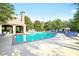 Refreshing community pool with a pavilion, lounge chairs and mature trees is ideal for summer relaxation at 2657 Lenox Ne Rd # 29-1, Atlanta, GA 30324