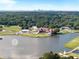 Aerial view of East Lake Golf Club with a water feature and skyline in the distance at 517 Daniel Ave, Decatur, GA 30032