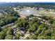 Aerial view of home near East Lake Golf Club surrounded by mature trees in a desirable neighborhood at 517 Daniel Ave, Decatur, GA 30032