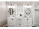 Elegant bathroom with double vanity, marble countertop, and stylish lighting at 517 Daniel Ave, Decatur, GA 30032