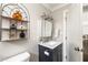 Stylish bathroom features a marble vanity, decorative shelving, and modern fixtures at 517 Daniel Ave, Decatur, GA 30032