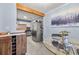 A stylish dining area adjacent to the kitchen, featuring a glass table and modern chairs at 1222 Crestwood Se Dr, Atlanta, GA 30316