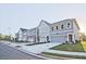 Street view displaying newly built townhomes with well-maintained lawns and attractive exteriors at 213 Admor Ln, Acworth, GA 30102