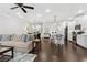 Open-concept home featuring a modern kitchen, dining area and living room with hardwood floors at 871 Dunning St, Marietta, GA 30060