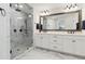 Main bath with marble floors, double vanity, and large glass enclosed walk-in shower at 871 Dunning St, Marietta, GA 30060