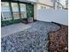 Fenced in back yard with stone and rock landscaping and ivy covered wall at 1510 Paramount Ln, Sugar Hill, GA 30518