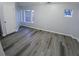 Bedroom with a door and windows for lots of natural light at 1510 Paramount Ln, Sugar Hill, GA 30518