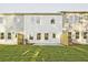 A backyard area with a small grass lawn and access to the building's utility systems at 205 Admor Ln, Acworth, GA 30102