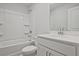 Bathroom with white cabinets, shower-tub, and chrome fixtures at 205 Admor Ln, Acworth, GA 30102