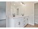Bathroom featuring double sink vanity with dark hardware at 205 Admor Ln, Acworth, GA 30102