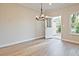 Dining area with modern chandelier and access to the outdoor space at 205 Admor Ln, Acworth, GA 30102