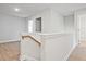 Hallway with wood trim, view of bedrooms and bathrooms at 205 Admor Ln, Acworth, GA 30102