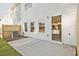 Concrete back patio with sliding glass doors to the kitchen at 205 Admor Ln, Acworth, GA 30102