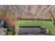 Aerial view of backyard featuring manicured lawn and deck with outdoor seating at 3060 Salisbury Ln, Cumming, GA 30041