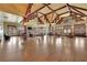 Spacious clubhouse featuring high ceilings, hardwood floors, a cozy fireplace, and ample seating for social gatherings and events at 3060 Salisbury Ln, Cumming, GA 30041