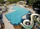 Gathering friendly community pool features a water slide and covered seating areas at 3060 Salisbury Ln, Cumming, GA 30041