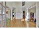 Bright foyer showcasing hardwood floors, high ceilings, and elegant architectural details at 3060 Salisbury Ln, Cumming, GA 30041